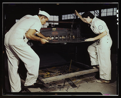Studying to operate a cutting machine, these two NYA workers receive education to match them for critical function, Corpus Christi, Texas. Right after eight weeks they will be eligible for civil service jobs at the Naval Air Base (LOC)